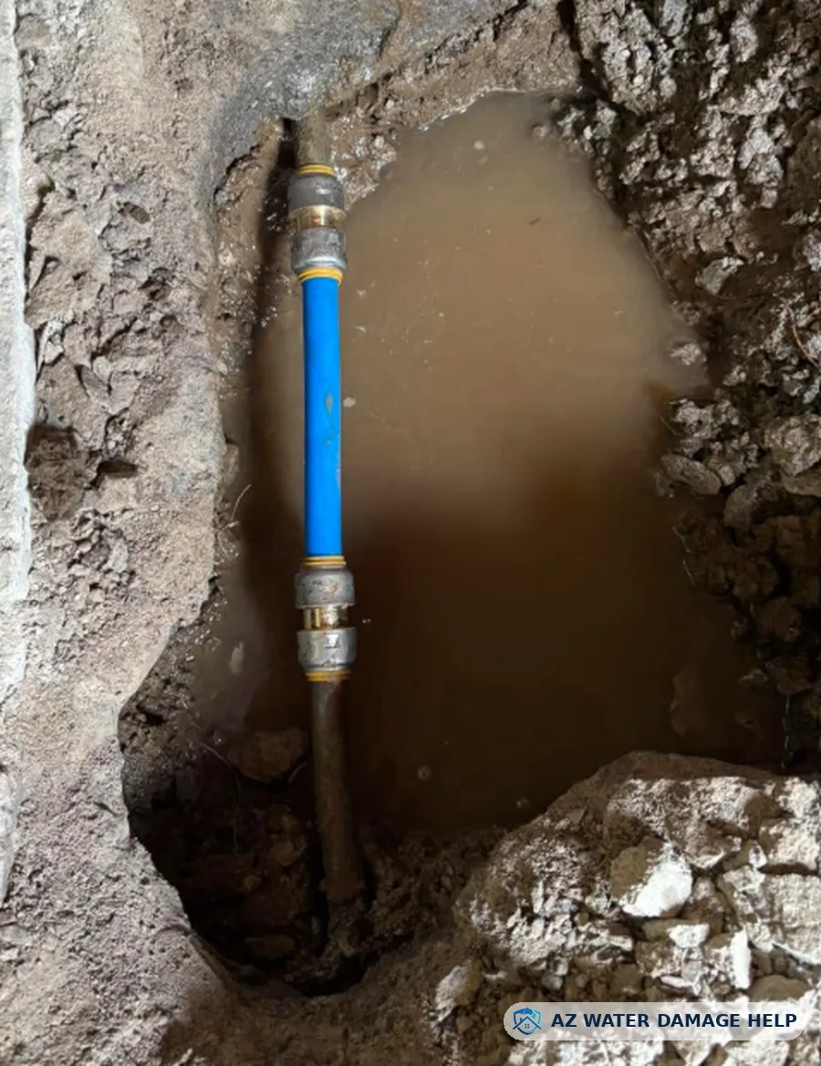Repaired underground water line with new fittings